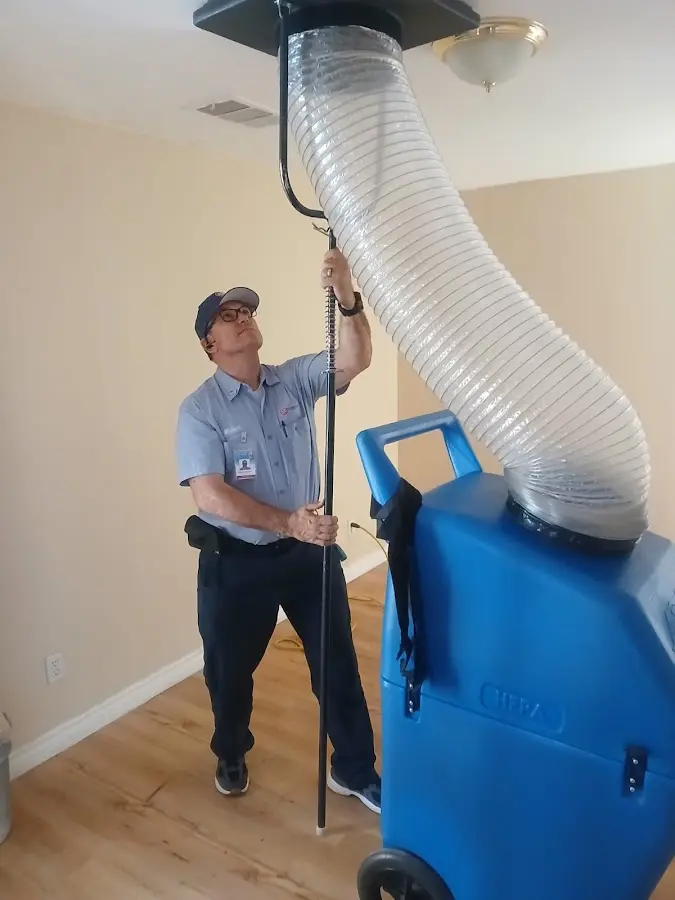 Furnace Tune-Up technician using HEPA equipment in Shaker Heights